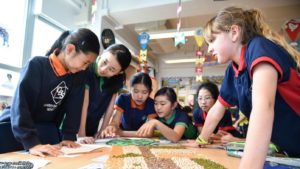 A picture of happy ESF Quarry Bay School students in class